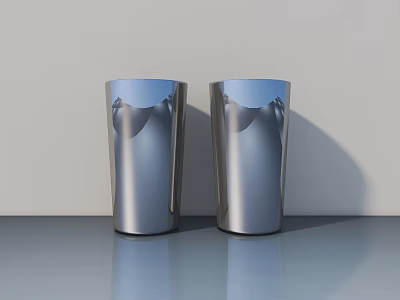Public Facilities Area With Two Silver Metal Cups Featuring Wave Patterns On Smooth Surface 3d model