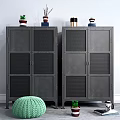 Dark Metal Cabinets With Decorative Items Green Knitted Pouf And Small Plants