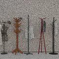 Colorful Coat Racks With Various Designs Holding Dresses Shirts And Hats For Home Use