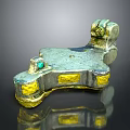Decorative Metallic Household Item With Green Accents And Yellow Decorative Blocks