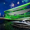 Seoul Wave Building Night Scene With Green Exterior Fireworks And Red Walkway