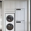 Modern White Stacked Washing Machine in Sleek Built in Laundry Cabinetry Design