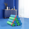 Colorful Rolled Household Yoga Mats Stacked In Modern Blue Living Room