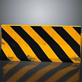 Yellow And Black Striped Traffic Barrier On Gray Surface With Reflection