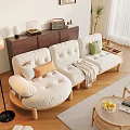 Cozy Cream Three Seater Sofa With Padded Seats Colorful Cushions Throw Blanket And Wooden Legs