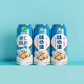 Walnut Peanut Flavored Beverage In Three Blue Cans With Label On Blue Background