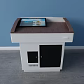 Functional Desk With White Body Brown Countertop Tablet Display And Black Cabinet Doors