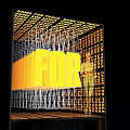 Modern Stage Design Featuring Giant Yellow FOR Lettering Grid Structure Lighting and Woman Watching