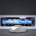 Contemporary Exhibition Space With White Irregular Reception Desk Black Ceiling Wall Artworks And Digital