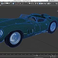 Green Classic Open Top Sports Car With Streamlined Bodywork And Vintage Design