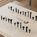 Various Hardware Tools Bolts Arranged On Wooden Tray With BULTEN Logo