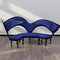 Blue Two Seat Leisure Chair With Unique Curved Design Black Frame And Wooden Floor Background