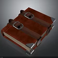 Red Cover Books With Brown Leather Buckles And Silver Corner Accents