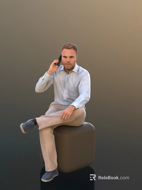 Man Talking On Phone Sitting On Black Cube With Light Blue Shirt And Beige Pants 3d model 