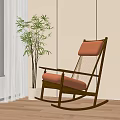 Comfortable Wooden Rocking Chair With Red Cushion Mesh Backrest And Green Plant
