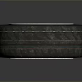 Car Tire With Alloy Wheel Rim And Red Center Cap On Gray Background