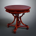 Classic Mahogany Round Table With Carved Legs And Vintage Decorative Design