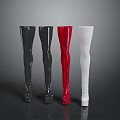 Stylish Shiny Over The Knee Boots In Black Red White Standing Side By Side On Dark Background