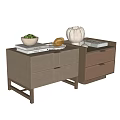 Modern Leather Nightstand Design With Drawers And Decorative Books On Top