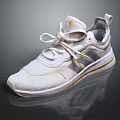 White Sporty Sneakers With Yellow Accents And Lace Up Design For Comfortable Wear