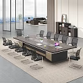 Modern Office Conference Table With Black Mesh Chairs Laptop And Plant On Top