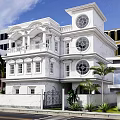 Elegant Classical Detached Villa With White Exterior Arched Circular Windows Balconies And Palm Trees