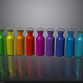 Colorful Water Bottles Arranged in a Row with Vibrant Hues for Daily Use