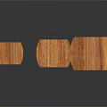 Three Wooden Stools With Curved Seats Slender Legs Wood Grain And Reflections On Dark Background