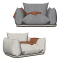 Stylish Gray and Beige Single Sofa with Orange Blanket for Cozy Living Space Design