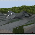 Modern Building With Wavy Roof Design And Glass Facade Surrounded By Trees