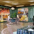 Thai Style Café Interior With Green Walls Hanging Lamps Wooden Chairs And Plants