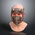 Intricate Metallic Facial Mask On Mannequin Head With Detailed Design