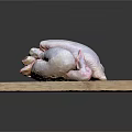 Fresh Raw Chicken Placed on Wooden Cutting Board for Preparation