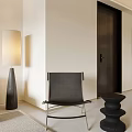Modern Leisure Chair With Small Side Table And Floor Lamp In Light Wall Room