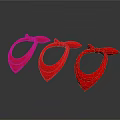 Three Shiny Red Bowties Displayed On Dark Background With Reflections