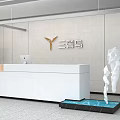 Modern Front Desk Reception Area With White Countertop Water Feature Sculpture And light Background