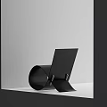Black Modern Accent Chair With Curved Frame And Minimalist Sleek Design