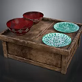 Carved Sculptural Red Bowls And Green Openwork Plates Displayed On Wooden Box