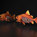Two Orange Fish 3D Models With Sharp Teeth And Skeletal Structure On Black Reflective Background 3d model