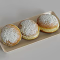 Three Golden Brown Pastries With Powdered Sugar On Rectangular Tray 3d model