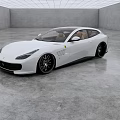 White Ferrari Two Door Car With Sleek Body And Black Wheels In Modern Indoor Space