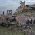 Scenic Ancient Castle Ruins On Green Hill With Stone Architecture And Trees