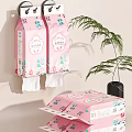 Pink Floral Pattern Tissue Packs With Stacked Boxes And Green Palm Plant