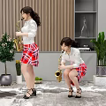Women Playing Saxophones In White Tops And Red Plaid Skirts With Plants Bookshelf And Sculpture