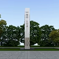 Tall White Monument At Haishida Cultural Tourism City With Green Trees And Lawn