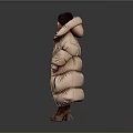 Woman In Long Puffer Coat With Shorts And Knee High Boots On Dark Background