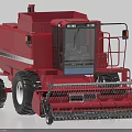 Modern Red Agricultural Combine Harvester With Large Tires And Harvesting Mechanism
