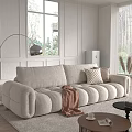 Beige Two-seater Sofa in Modern Living Room with Brown Blanket Checkered Pillows and Floor Lamp