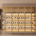 Modern Wine Cabinet With Glass Door Layered Shelves And Elegant Lighting For Wine Bottles