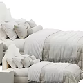 Modern Beige Double Bed With Curved Headboard Plush Pillows And Nightstand
